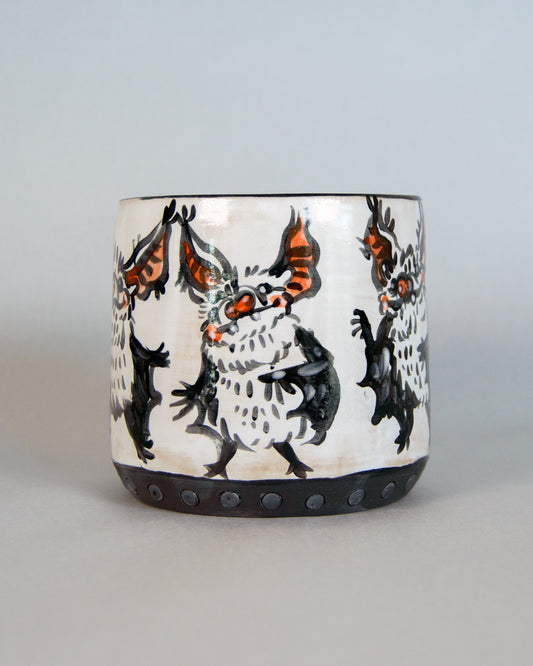 ceramic planter with bat design