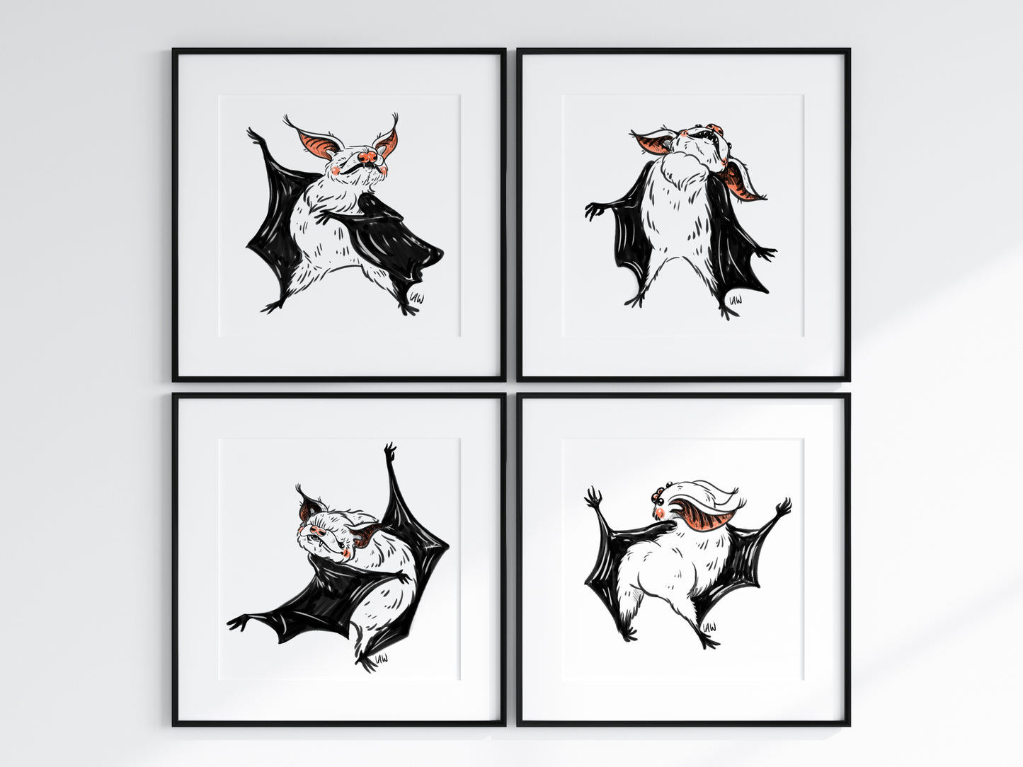 Four framed illustrations of bats on a white background