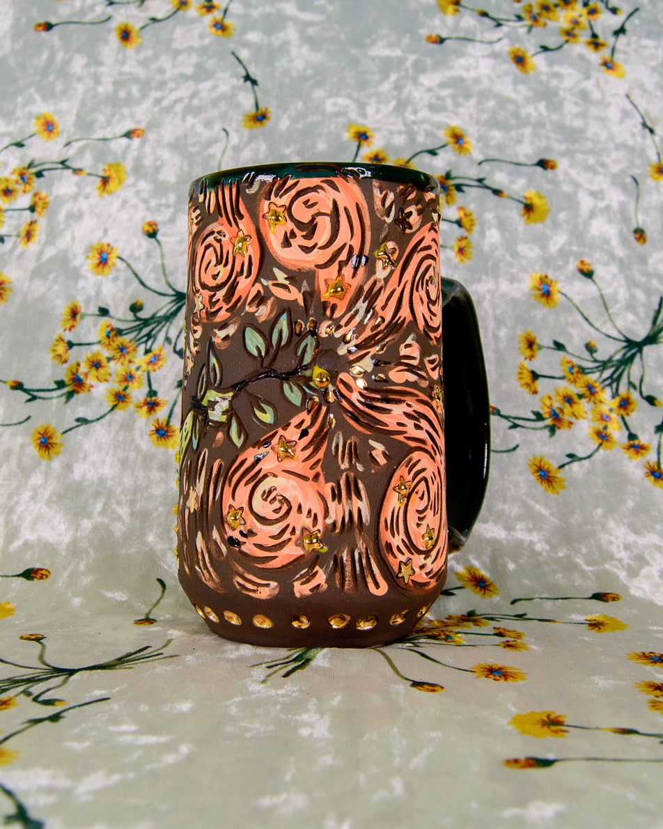 Ceramic mug with cartoon magic designs and gold shiny star accents