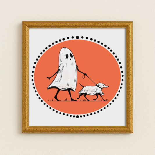 Framed artwork of a ghost walking a dog on an orange circle background
