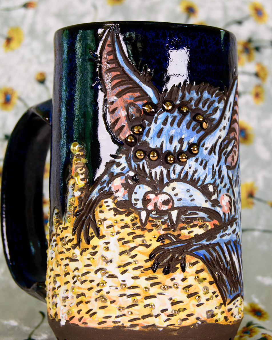 Mug with a colorful bat animal design on a floral background