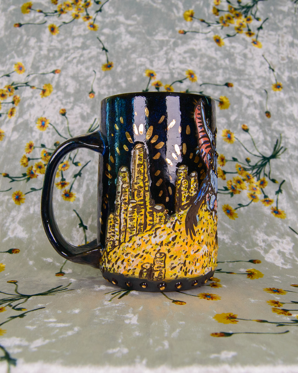 Decorative mug with artistic gold coins design on a floral background