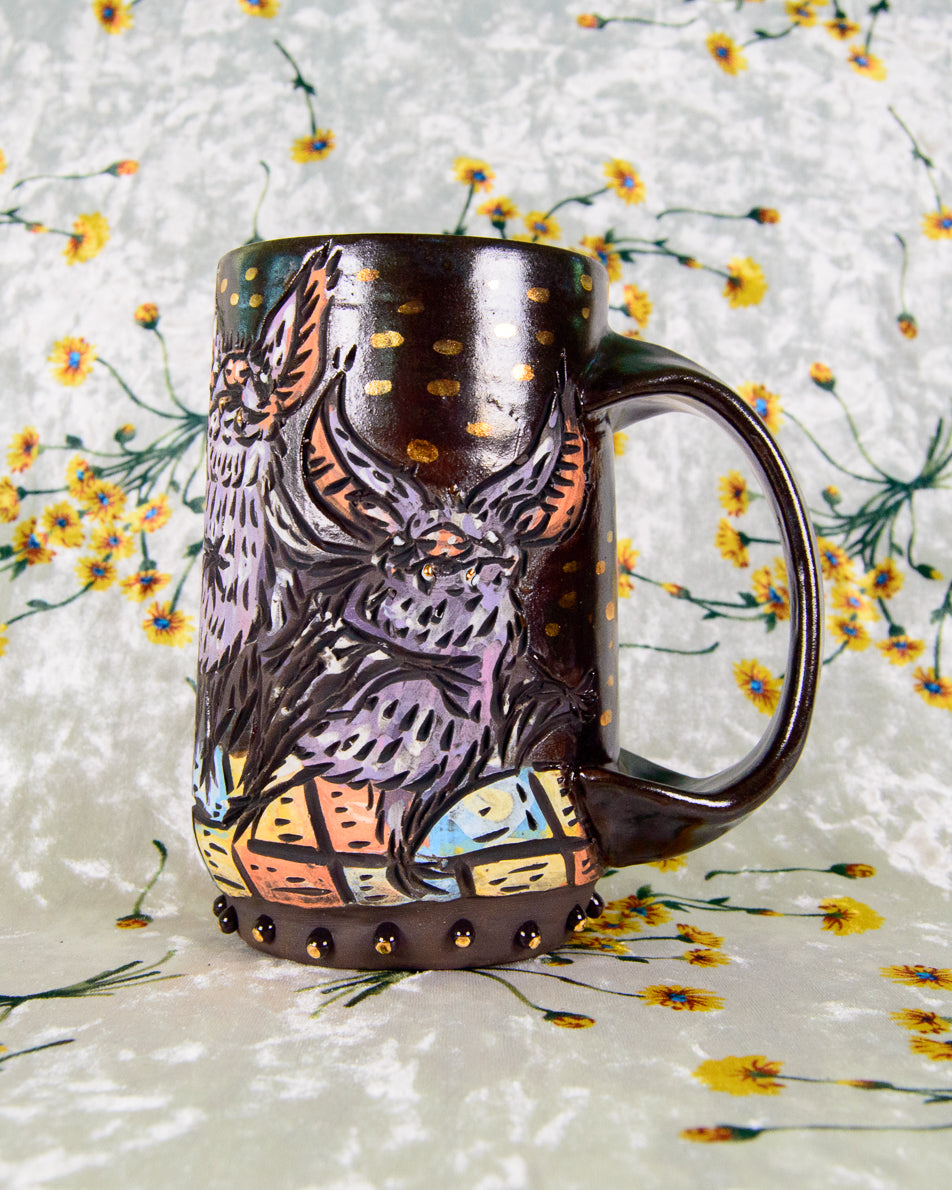 Colorful stoneware mug with cute cartoon dancing bat designs