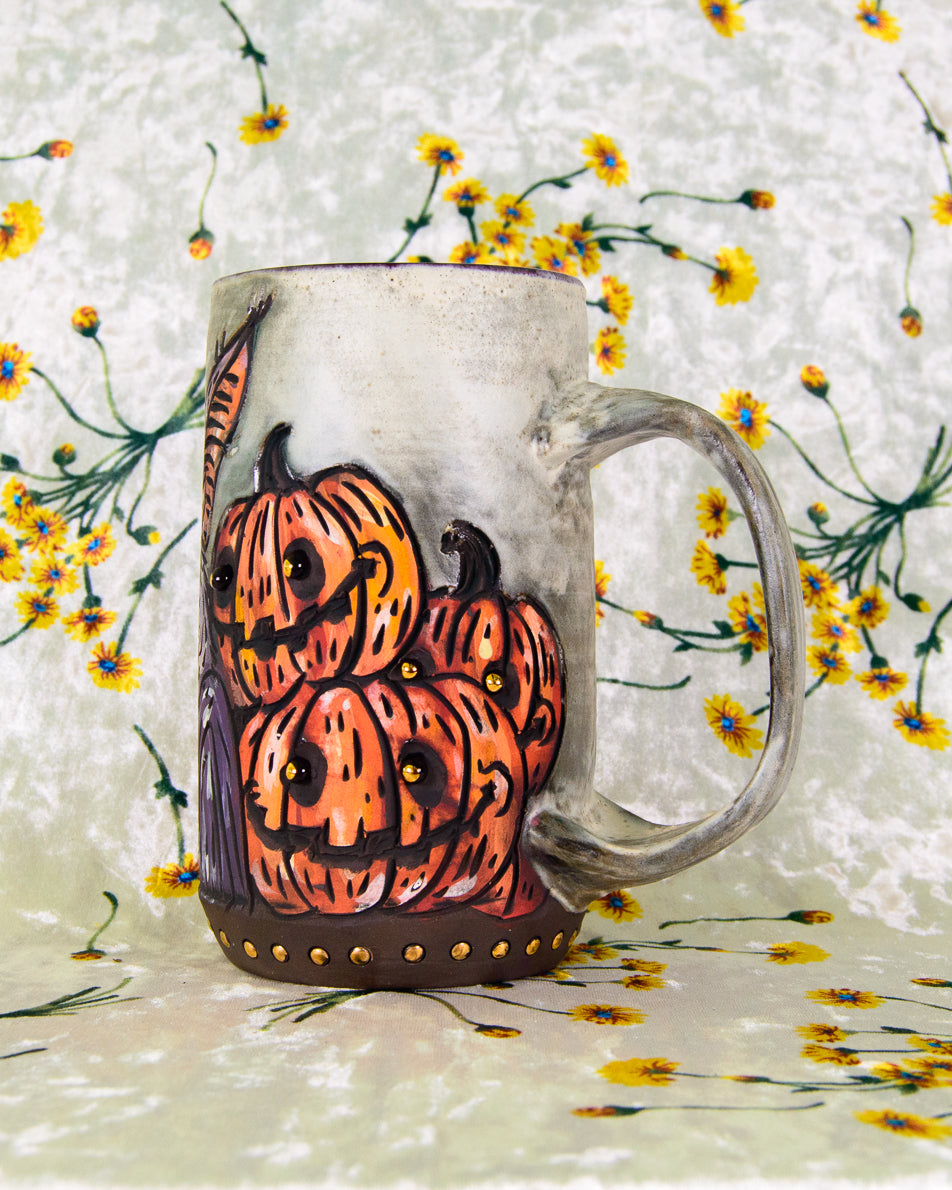 Mug with pumpkin design on a floral background