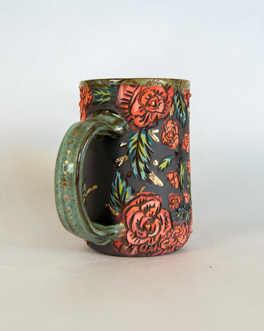 Ceramic mug with floral pattern on a white background