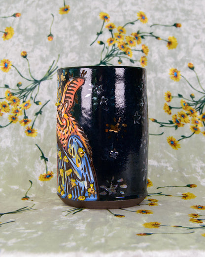 Black ceramic cup with gold and rainbow pearl stars