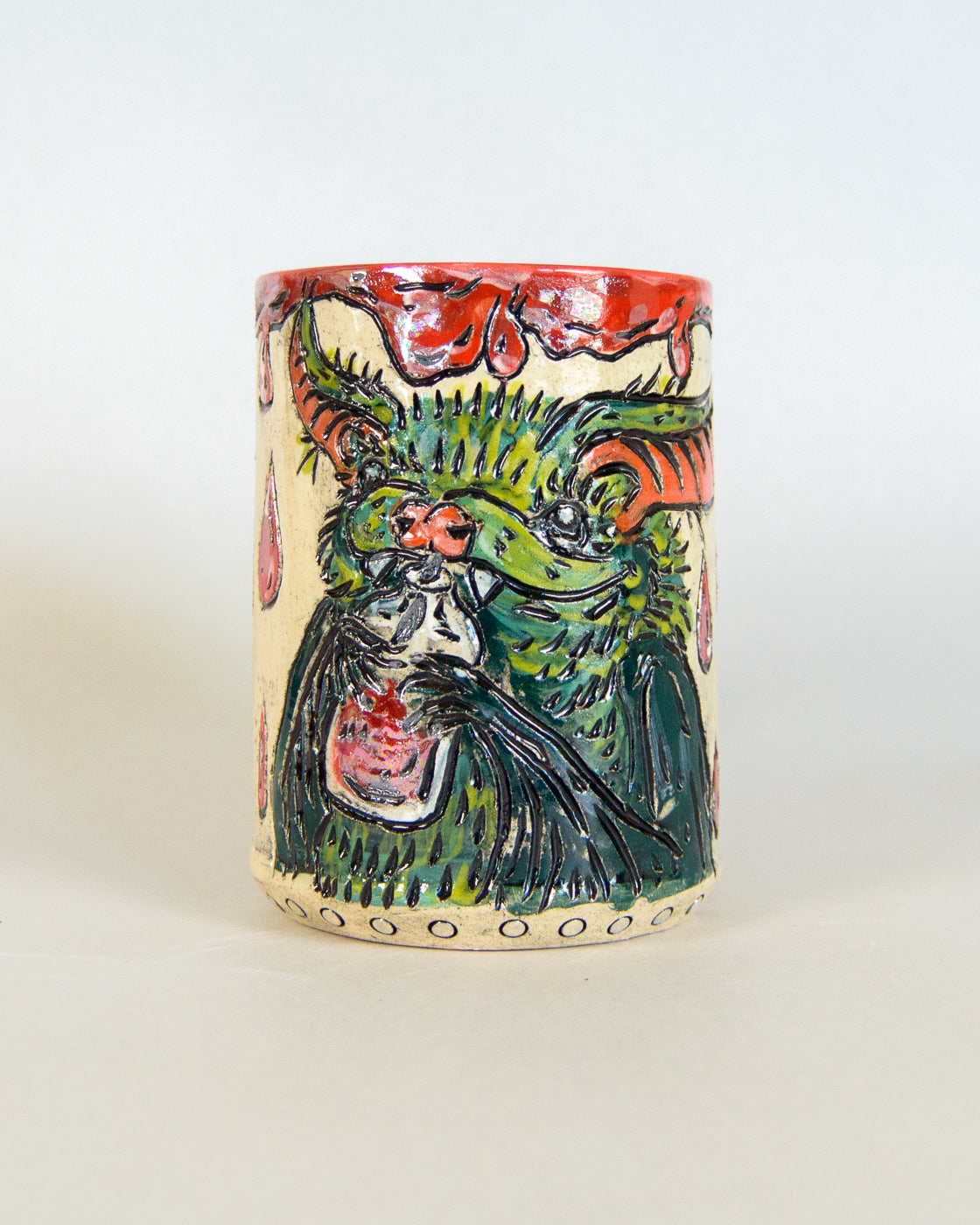 Ceramic mug with a bat design on a white background