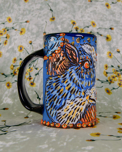 Mug with a colorful UFO alien ship and cow design