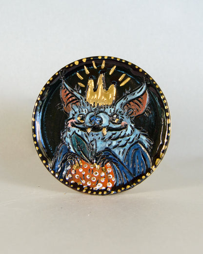 Ceramic coaster with fantasy bat design