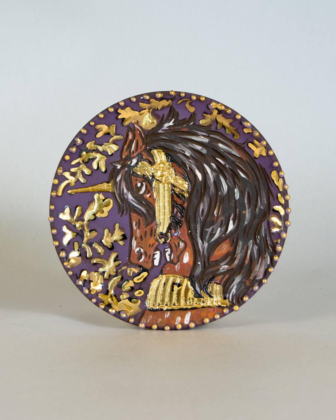 Ceramic coaster with unicorn design