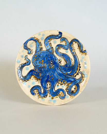 Ceramic coaster with octopus design