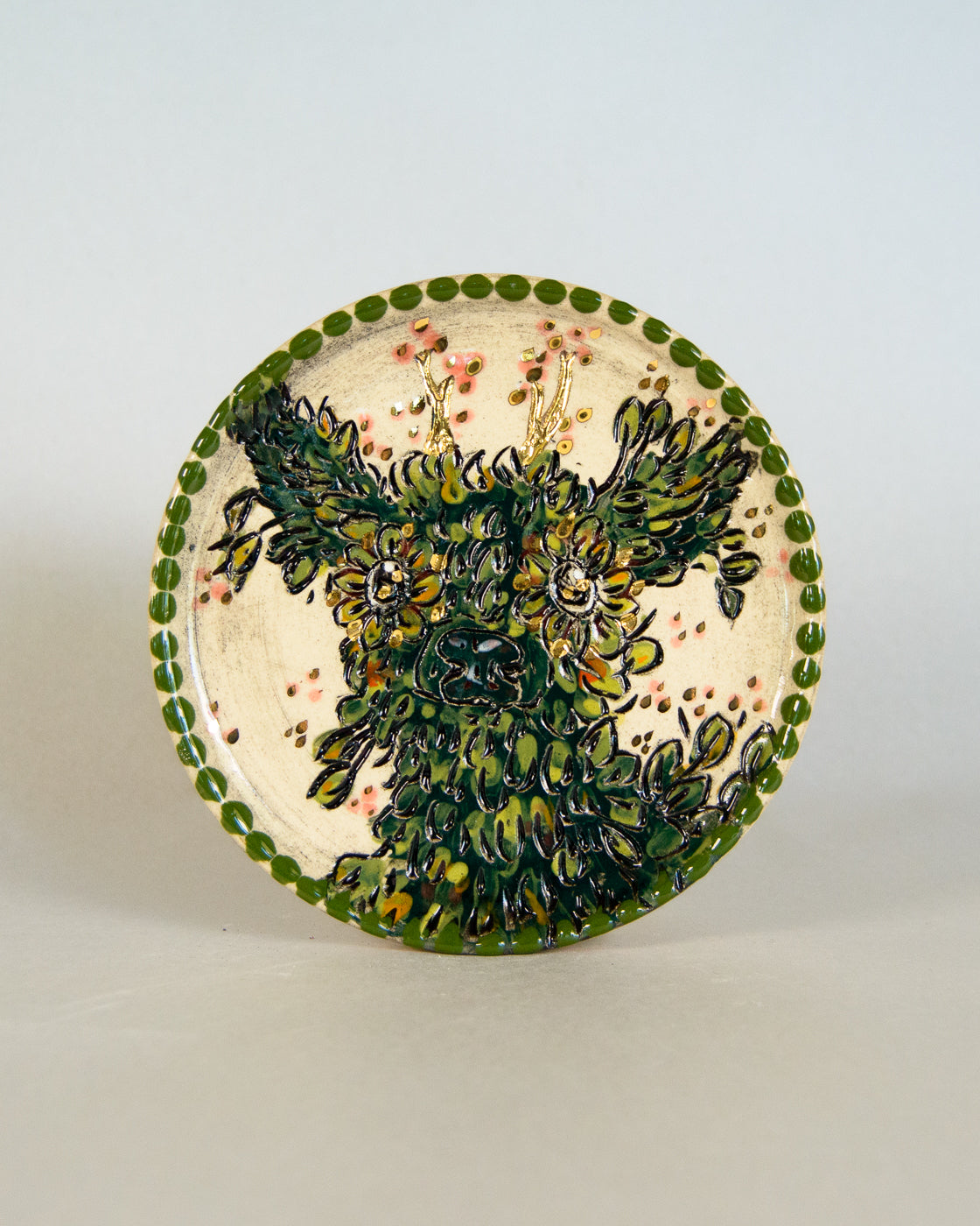 Ceramic coaster with deer design