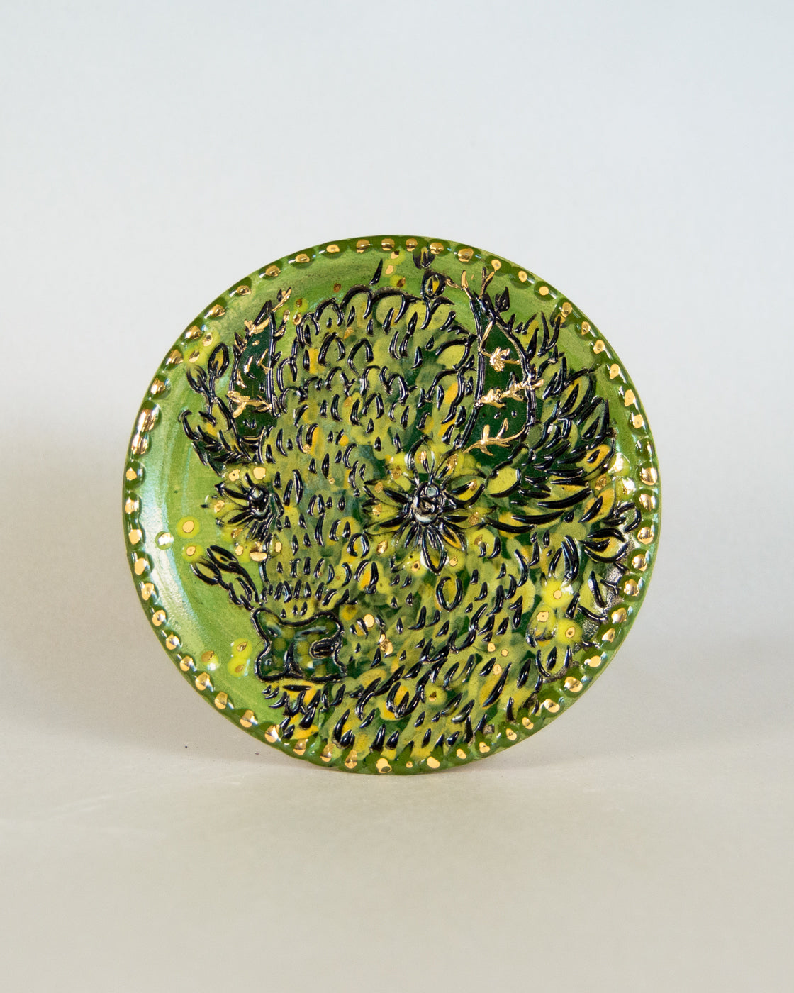 Ceramic coaster with bison design