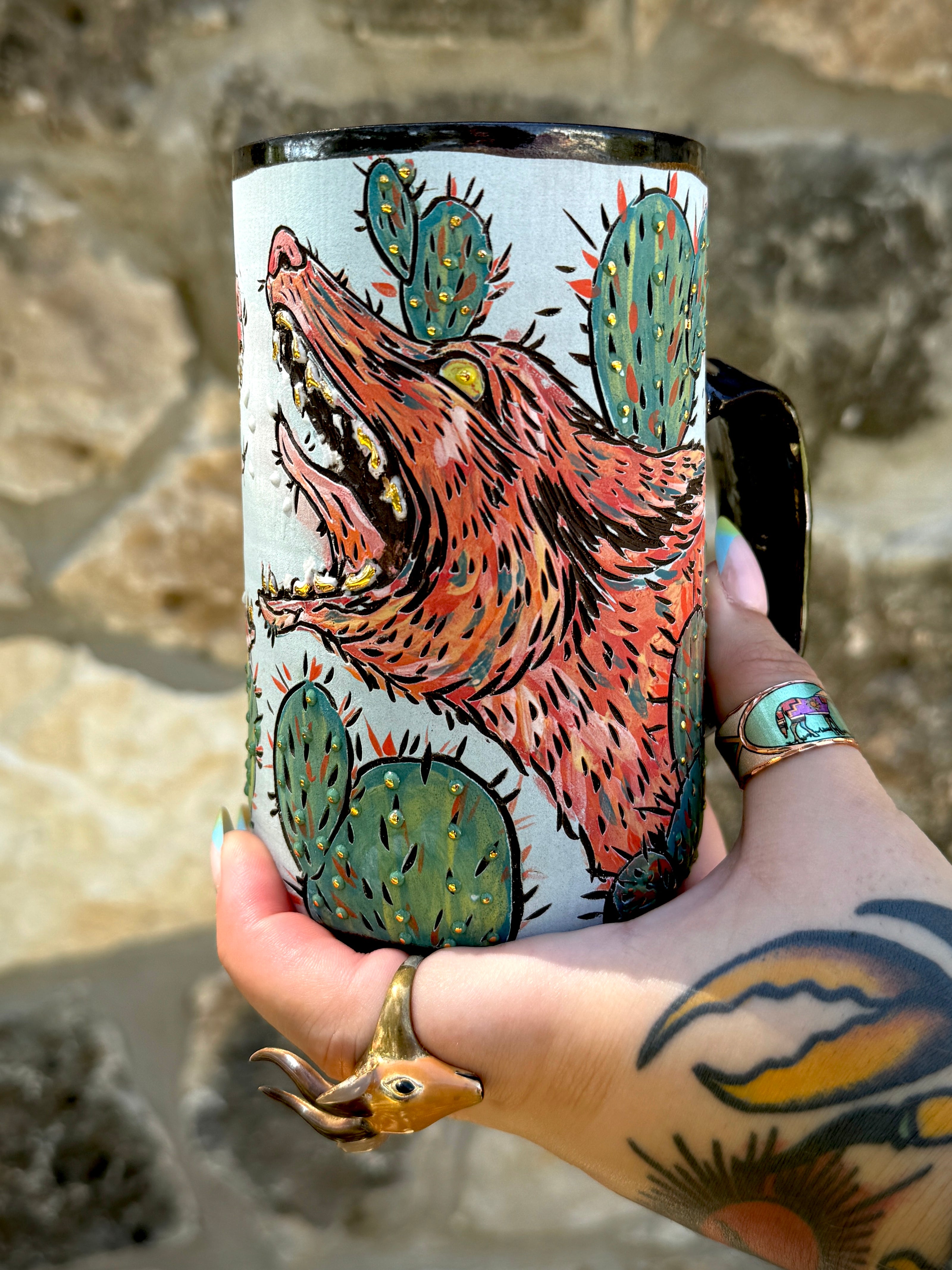 Handmade ceramic stoneware mug with a cool illustration of barking coyotes and cacti