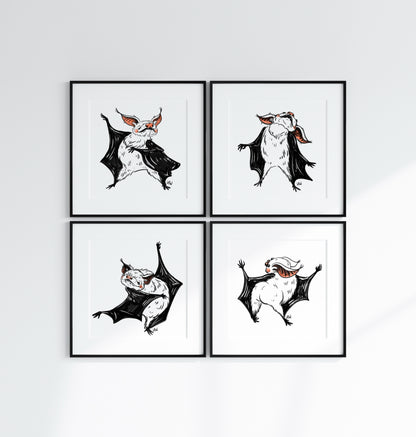 Four framed illustrations of bats on a white wall
