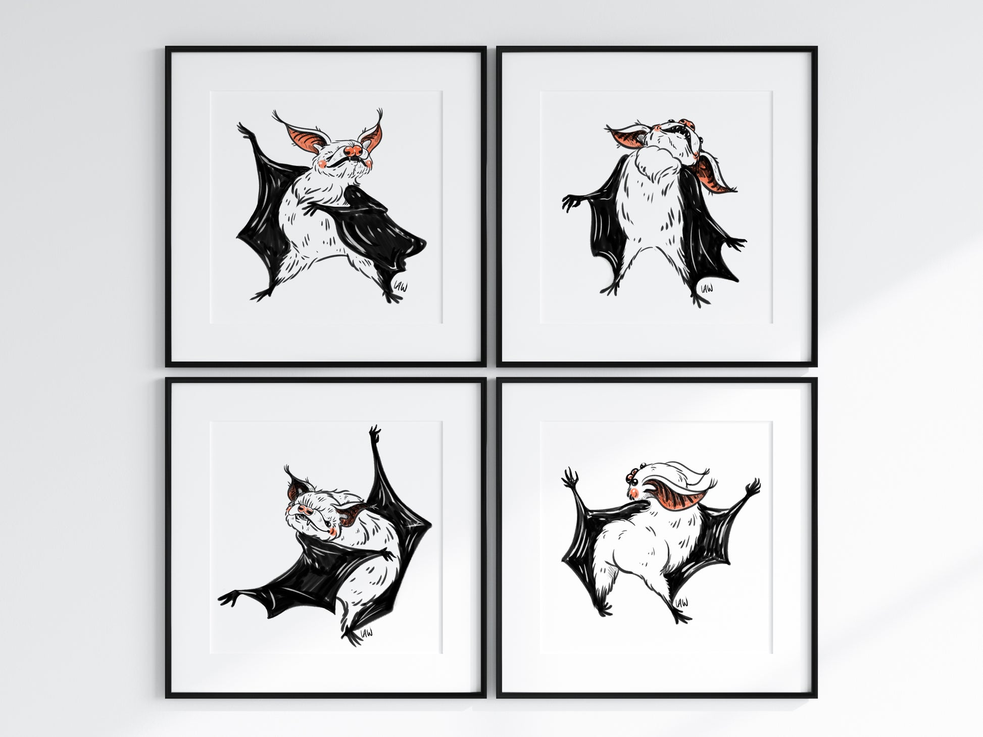 Four framed illustrations of bats on a white background