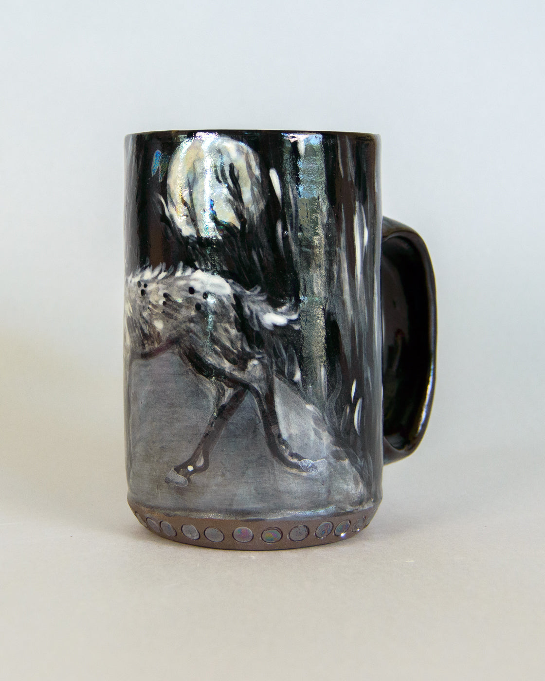 Mug with a deer and moon design on a white background