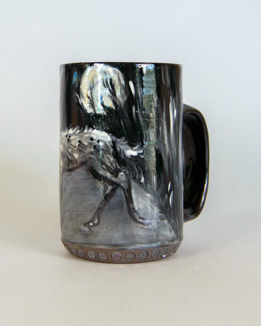 Mug with a deer and moon design on a white background