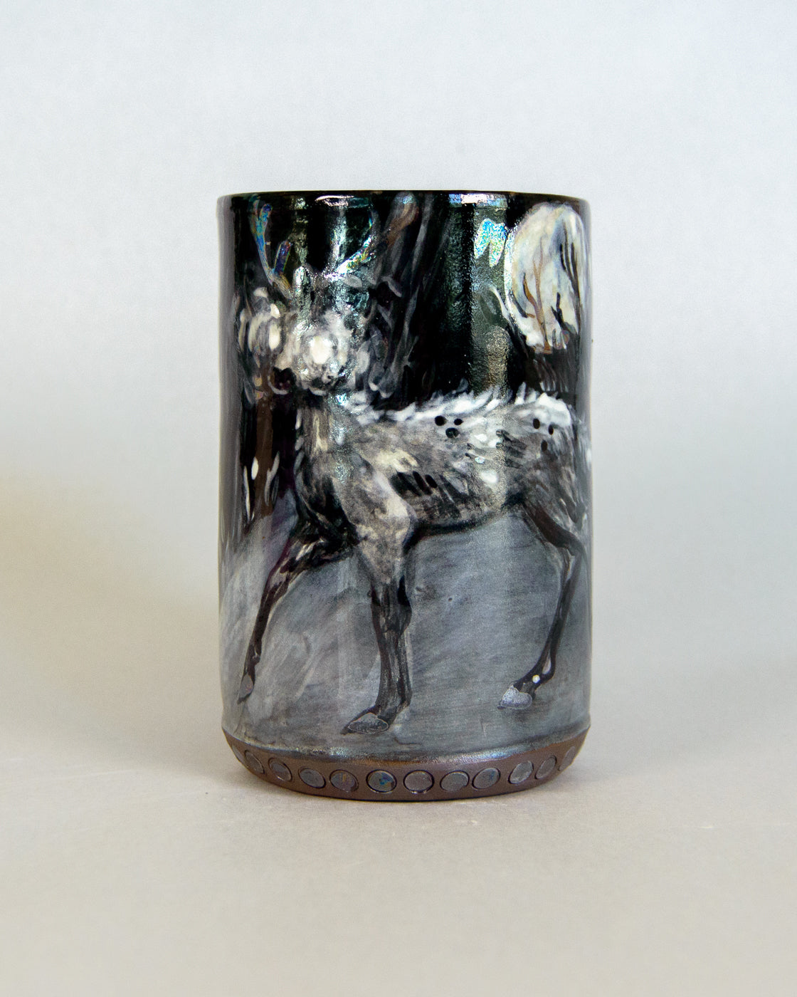 mug with a deer design on a white background