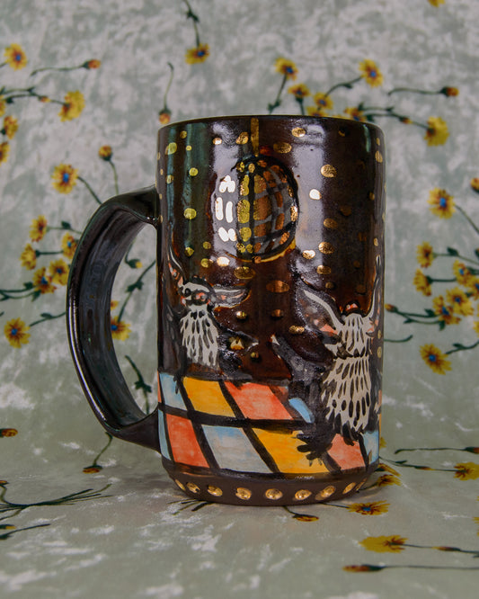 Decorative ceramic mug with a gold disco ball and dancing bats design
