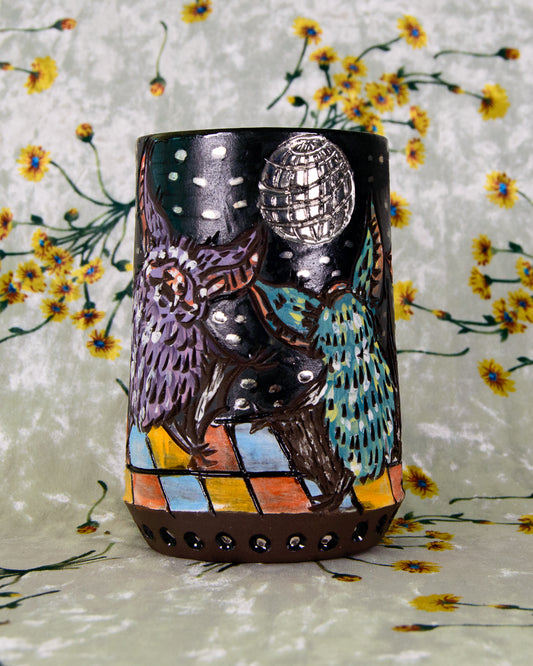 Black decorative mug with dancing bat designs and reflective silver disco ball