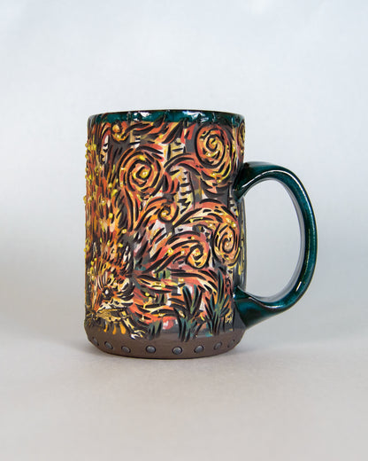 Decorative mug with a colorful abstract pattern on a white background