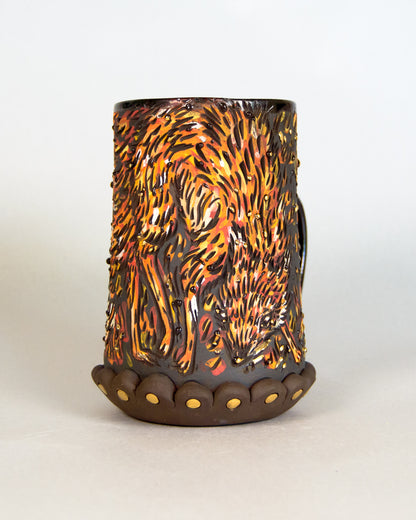 Decorative candle holder with fox design on a white background