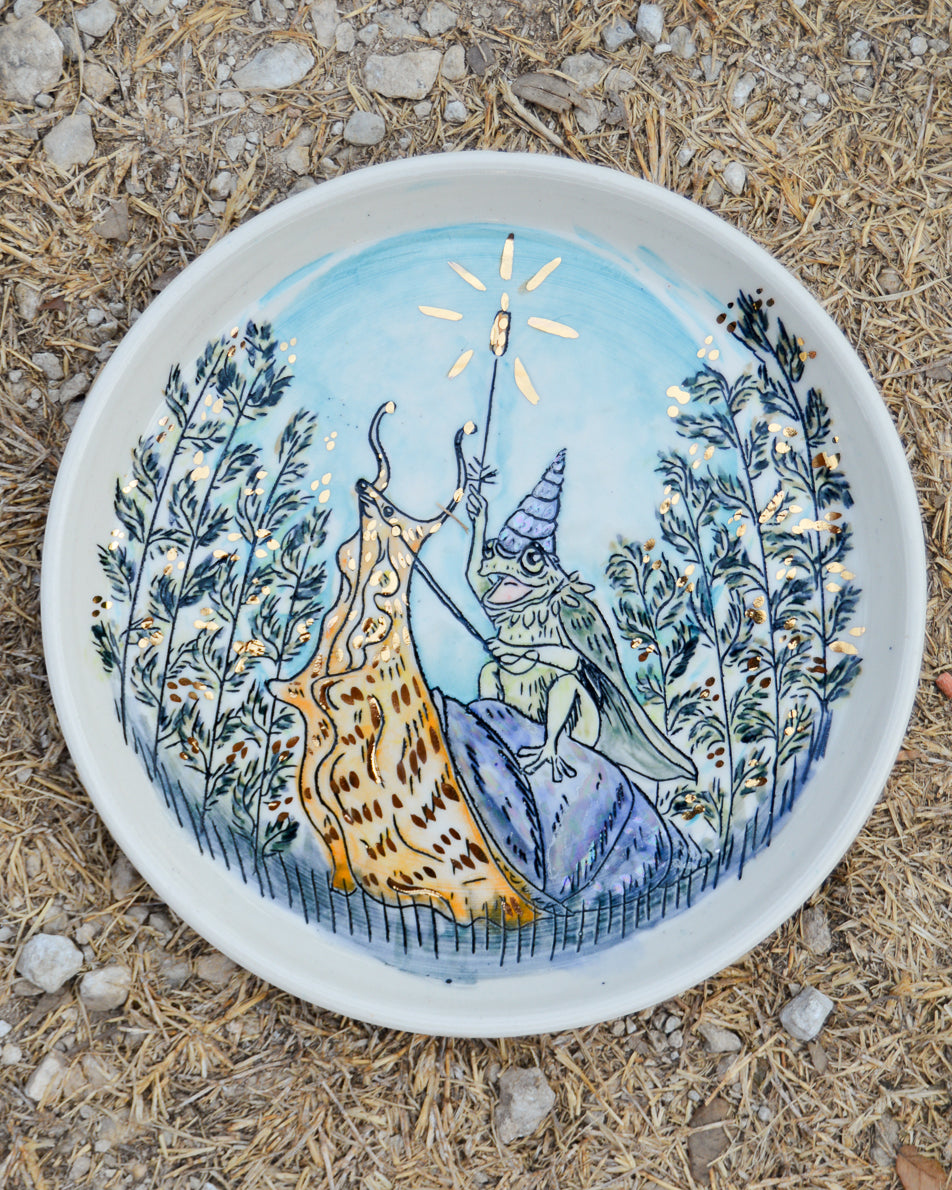 Handmade ceramic porcelain plate with a whimsical design of a frog paladin riding a snail