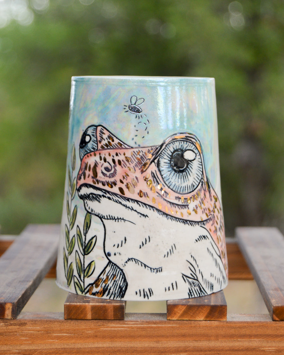 Handmade ceramic porcelain mug with a frog design