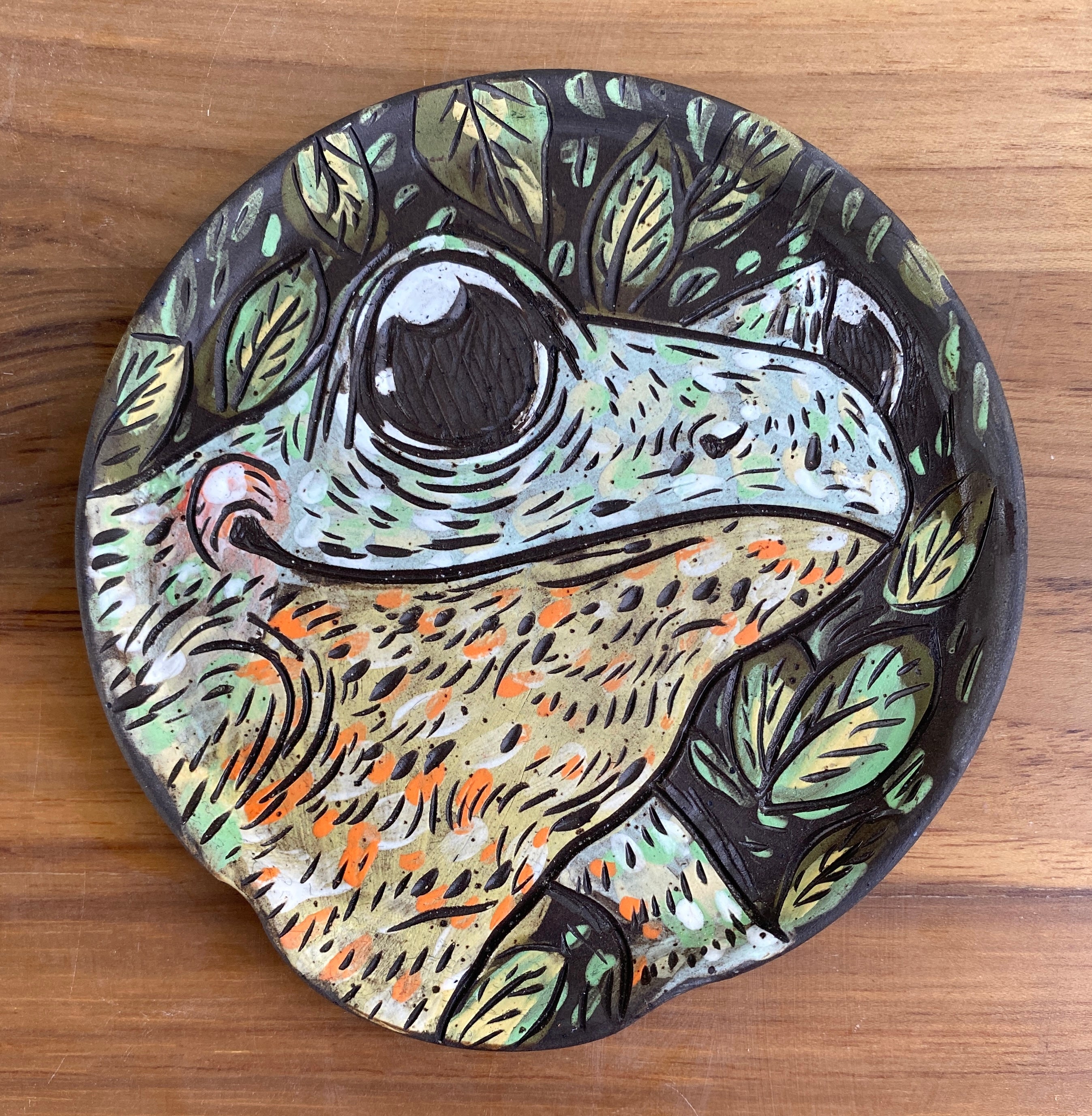 Handmade ceramic stoneware spoon rest with frog and leaf patterns