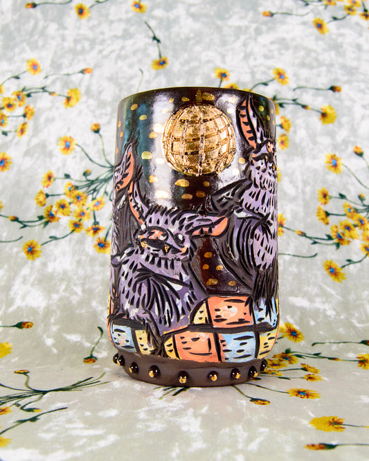 Handmade ceramic mug with cute cartoon bats dancing under a gold disco ball
