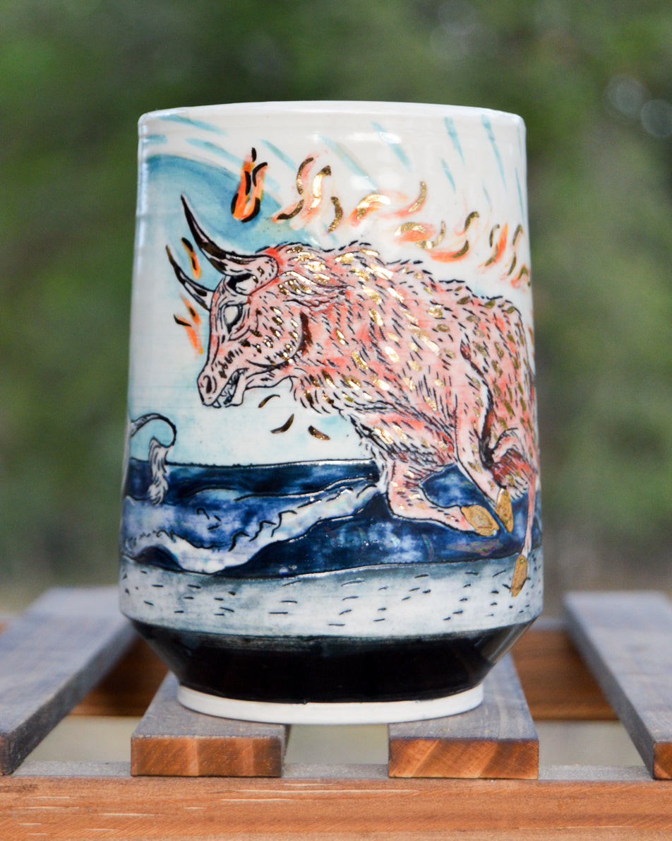 Handmade ceramic porcelain mug with red bull design from a scene of the movie the last unicorn