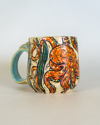 Ceramic mug with an octopus design on a light background
