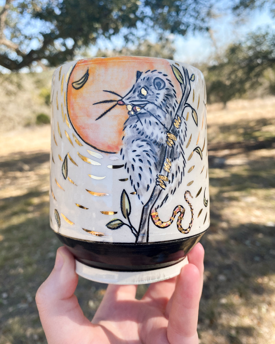 Handmade ceramic porcelain mug with a cute possum design