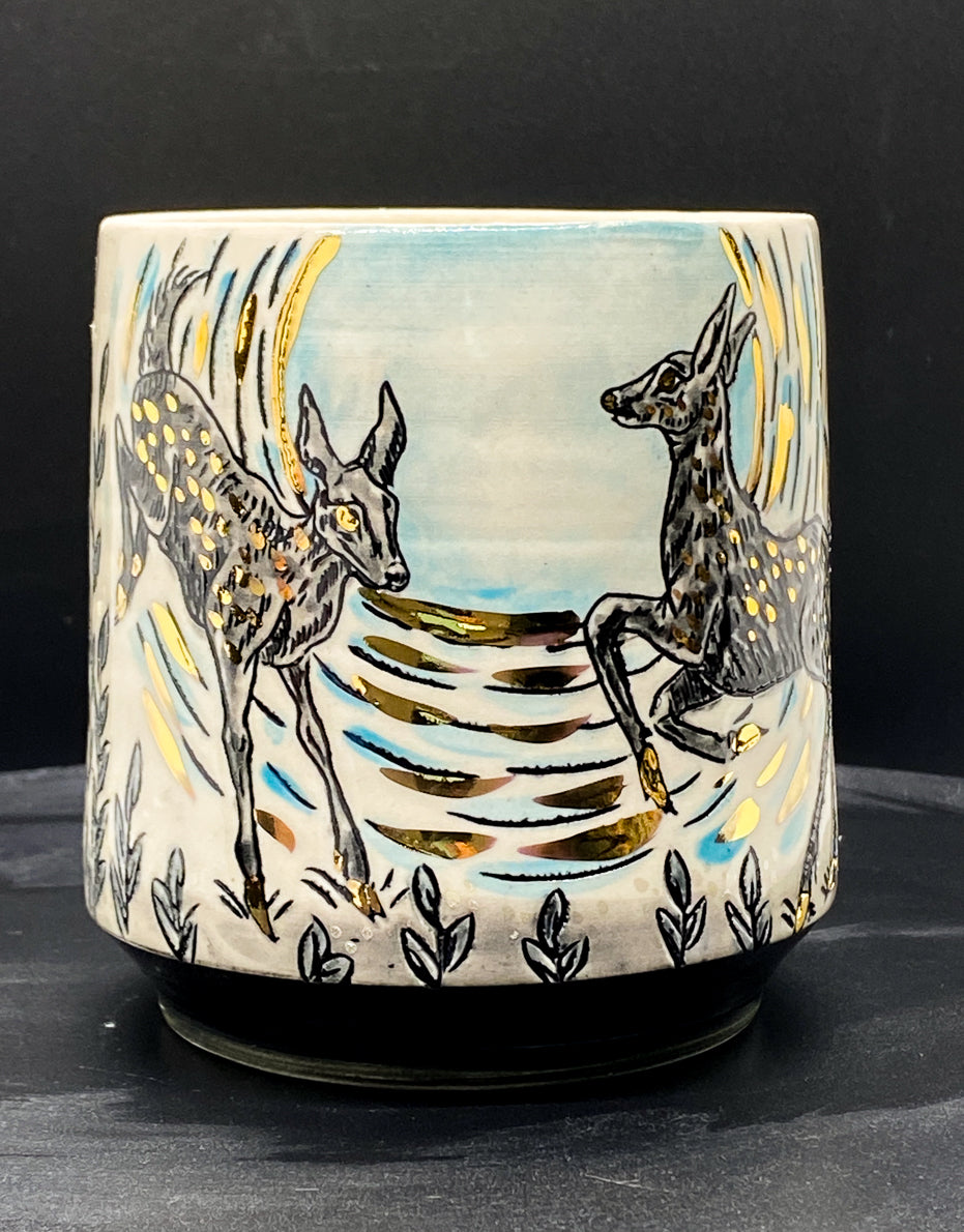 Handmade ceramic porcelain mug with deer design
