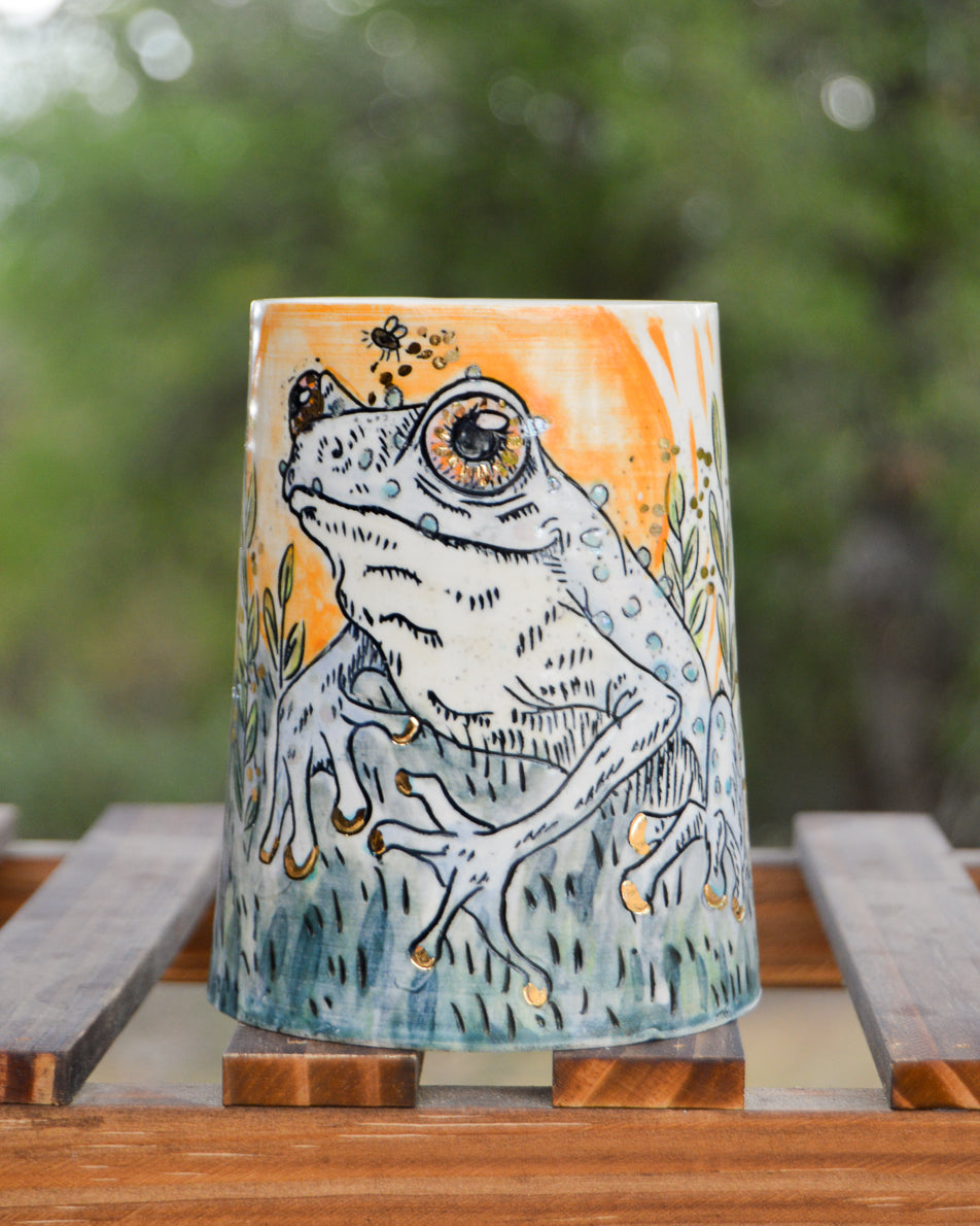 Handmade ceramic porcelain mug with cute frog design