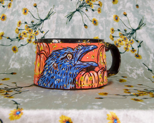 Colorful mug with a bird design on a floral background