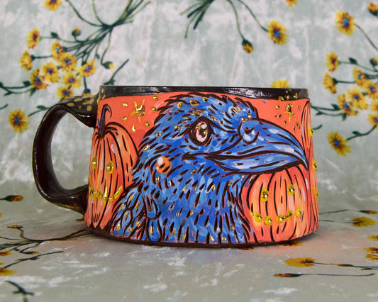 Colorful mug with a bird design on a floral background