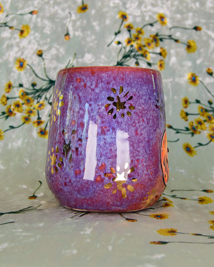 Ceramic wine cup with pretty purple and blue glaze and gold luster stars