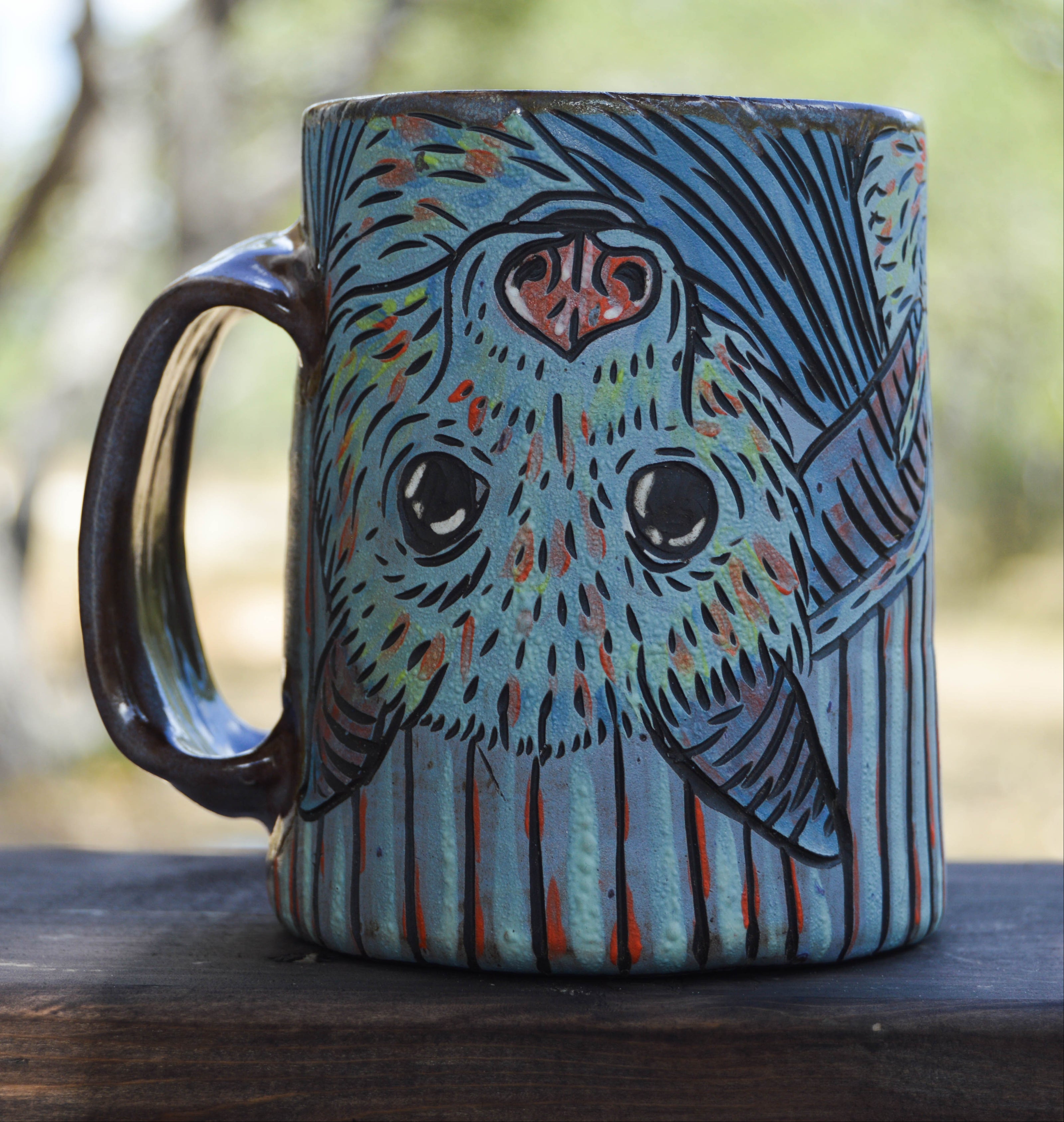 Handmade ceramic stoneware mug with cute stylized bat designs