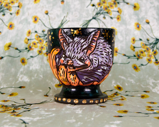 Ceramic goblet cup with a cute cartoon bat and pumpkin design