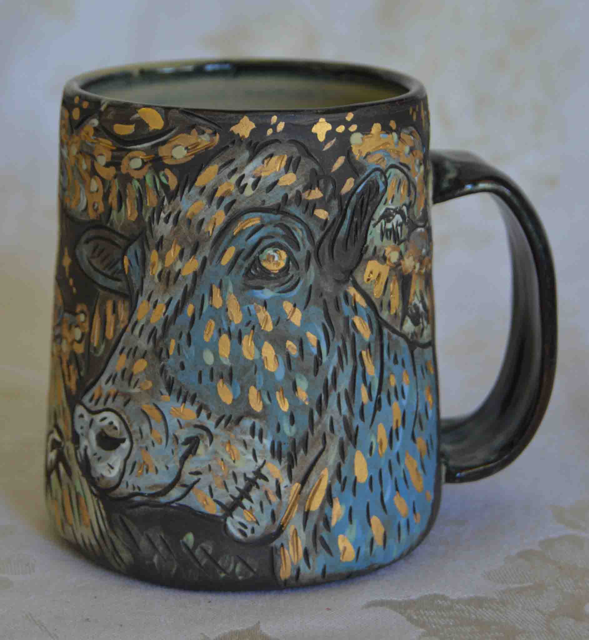 Handmade ceramic stoneware mug with purple and green cow and alien ufo ship designs