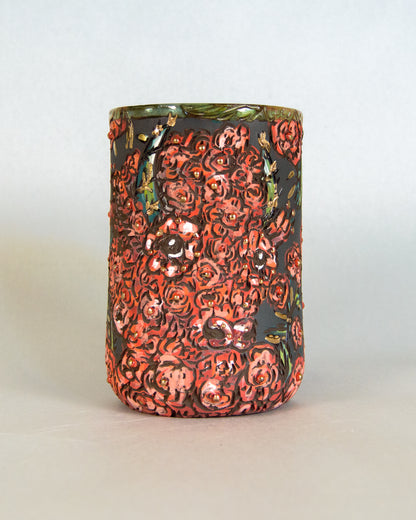 Decorative vase with floral bison pattern on a light background