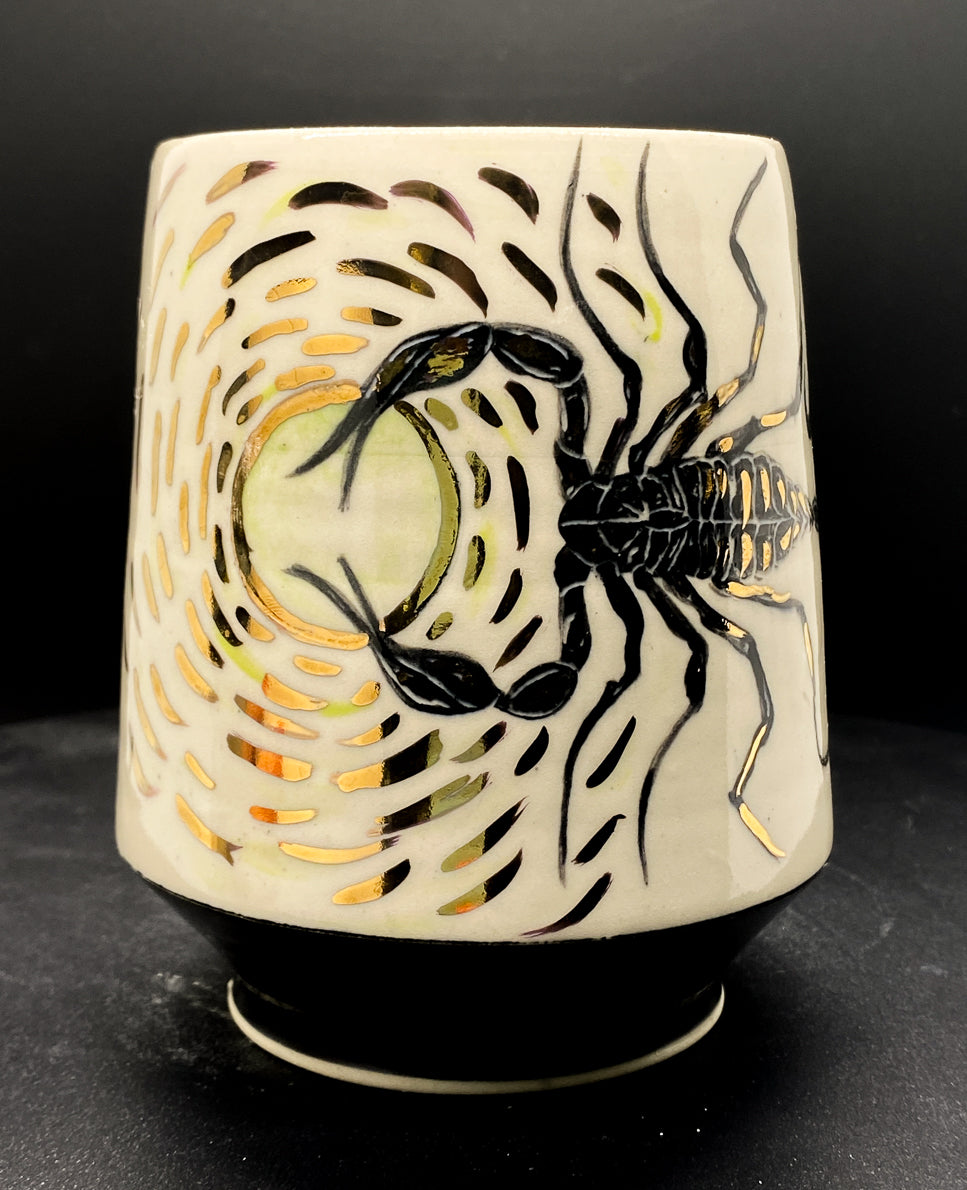 Handmade ceramic porcelain mug with a scorpion design for the scorpio zodiac