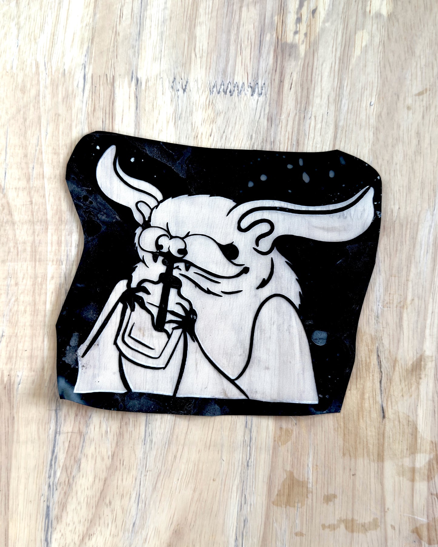 Black and white silkscreen of a bat