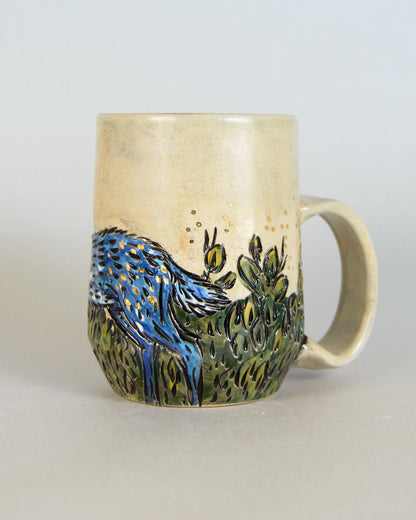 ceramic mug with a deer and bush design
