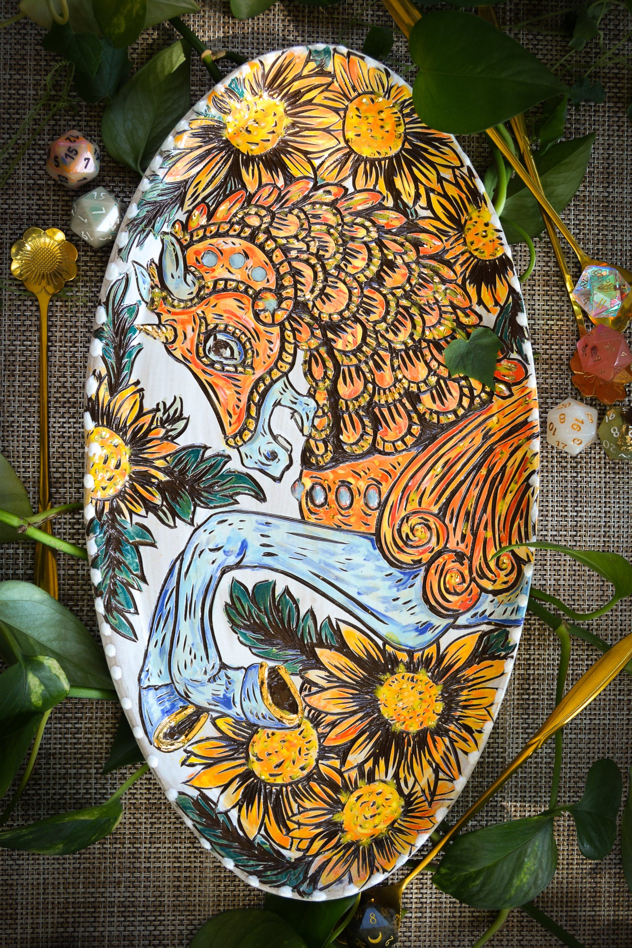 Handmade ceramic stoneware plate with an ornate unicorn and flower design